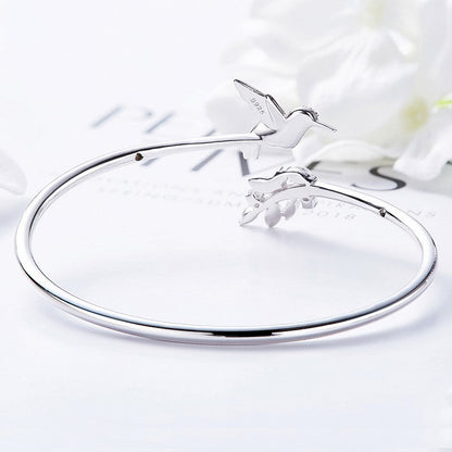 AYANA – Eleganter verstellbarer Kolibri-Ring mit funkelndem Strassdiamant