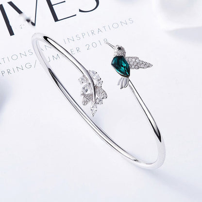 AYANA – Eleganter verstellbarer Kolibri-Ring mit funkelndem Strassdiamant
